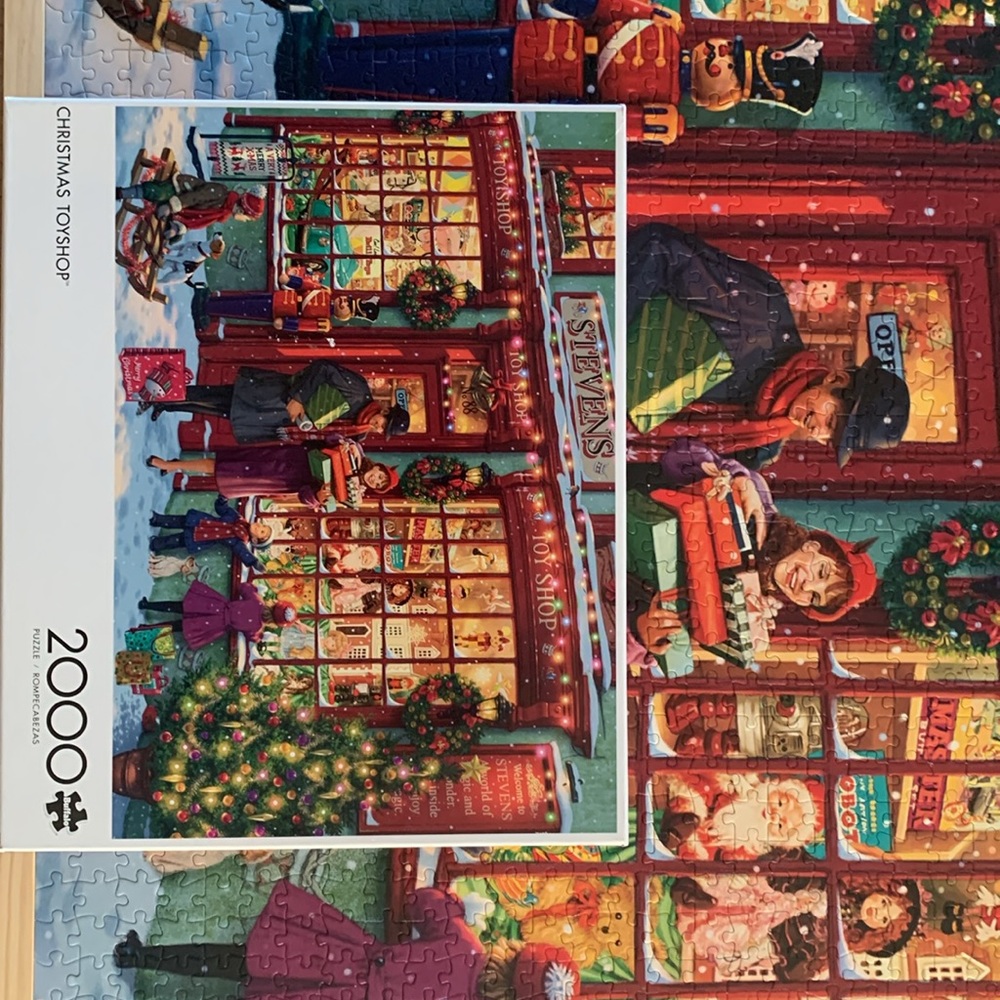Buffalo Games 2000 piece “Christmas Toy Shop” jigsaw puzzle. - Picture 2 of 5